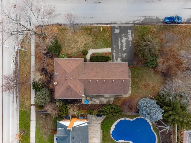 Top-down aerial of a house and pool